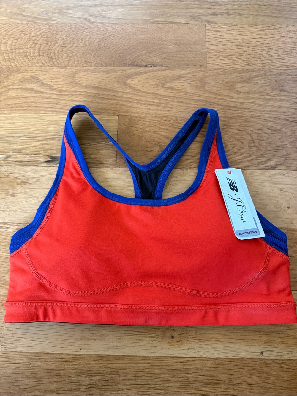 NWT New Balance x J. Crew Sports Bra, Orange w/blue trim, Sz L (36AB-38A).